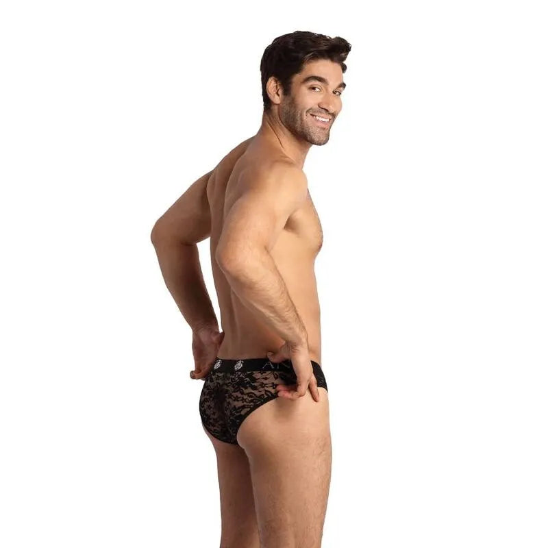 Homme portant slip noir en dentelle florale, bande élastique à la taille, design Anais Men Romance, vue latérale.