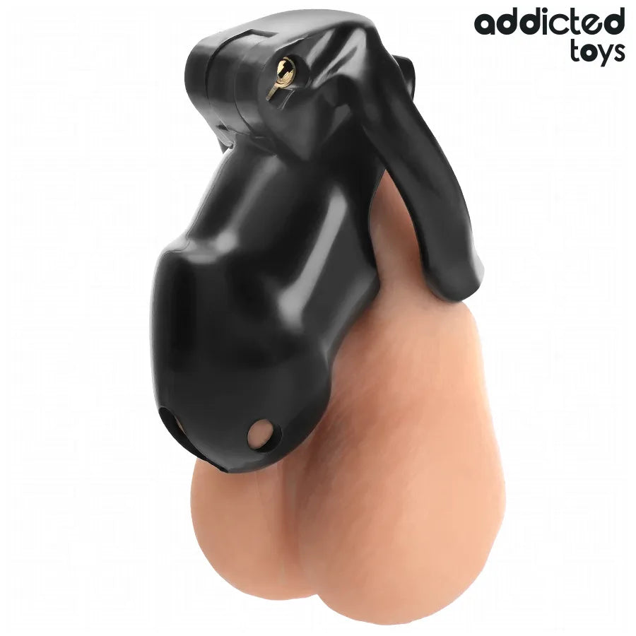 Cage de chasteté noire ergonomique en matériaux solides pour confort et sécurité, adaptée débutants et experts.