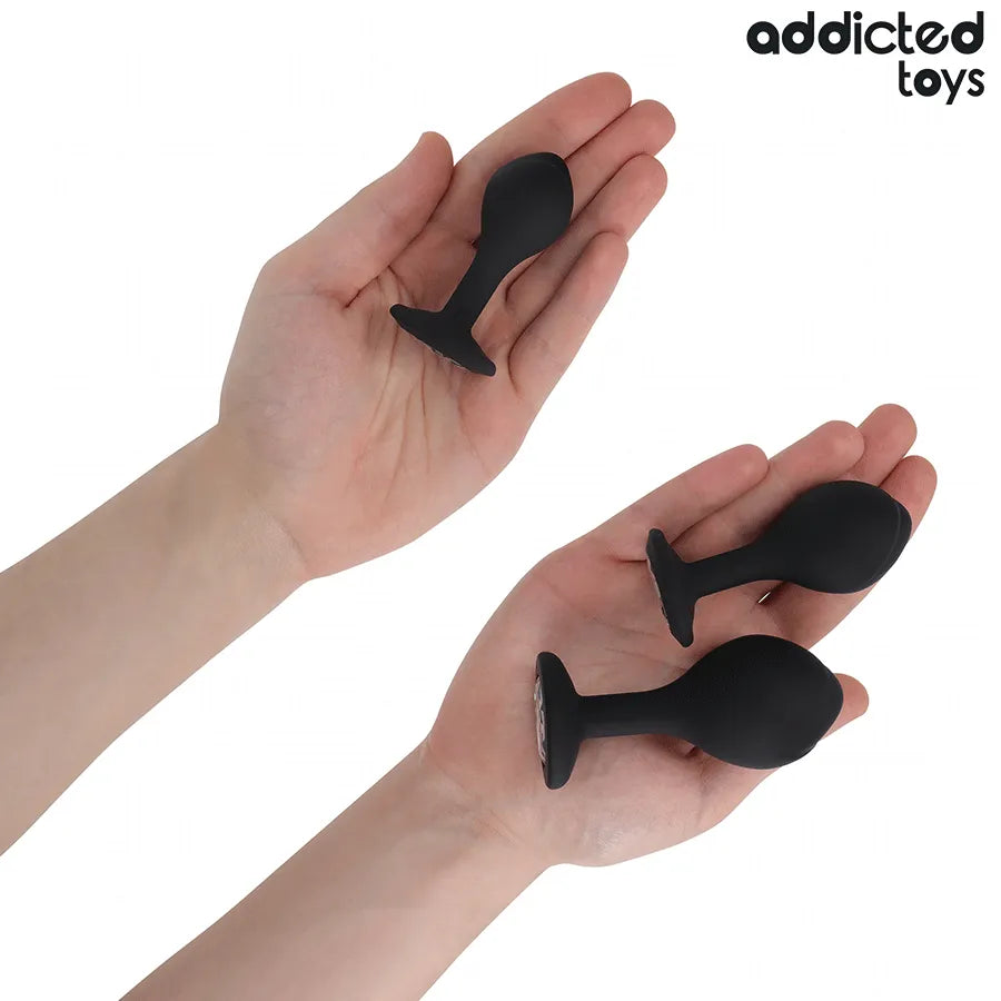 Lot de 3 plugs anaux noirs en silicone hypoallergénique avec bijoux, forme sphérique étagée pour stimulation progressive.