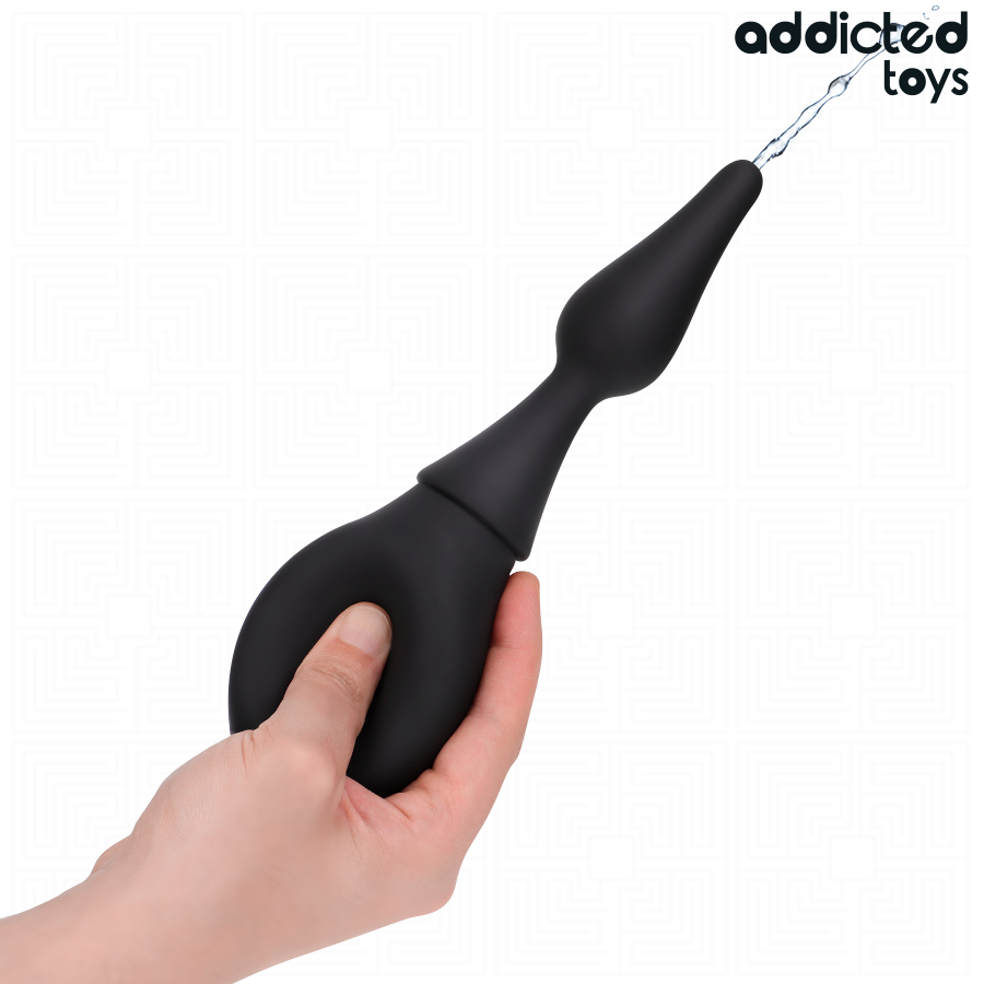 Nettoyant de voyage Addicted Toys noir, forme ergonomique, idéal pour l'hygiène des sextoys en déplacement.