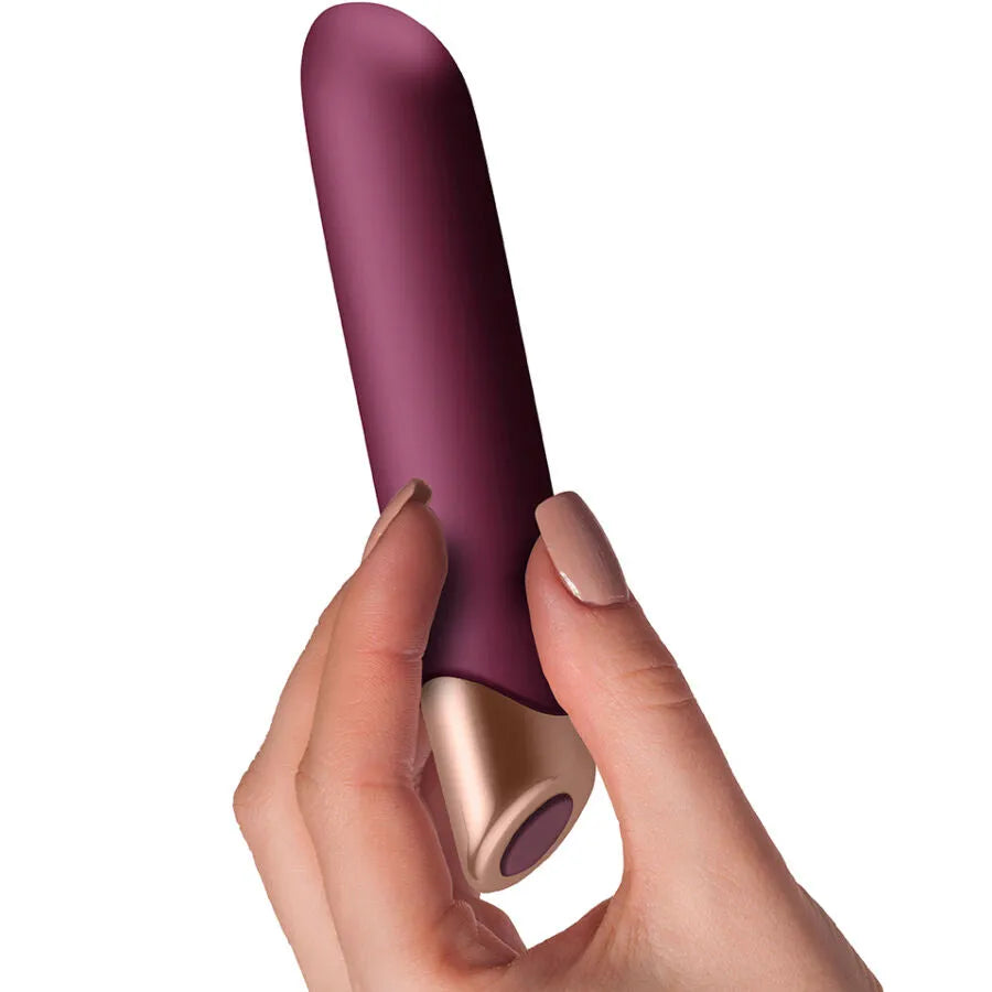 Vibromasseur Miyana élégant, couleur prune, pointe conique dorée, design raffiné pour stimulation précise et profonde.