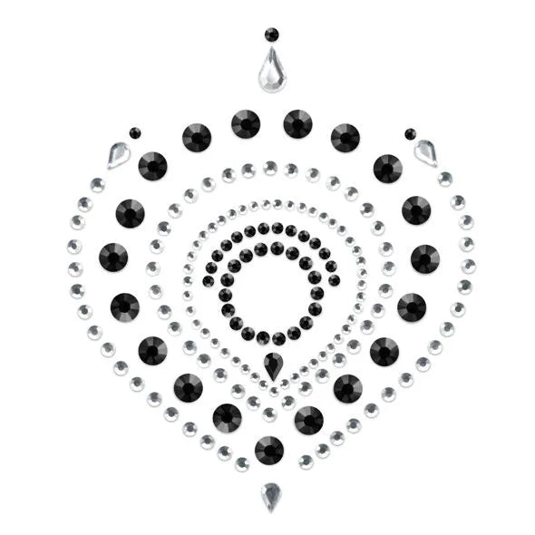 Bijoux intimes noirs et argentés, motifs lumineux en cercles concentriques, élégance et séduction corporelle.