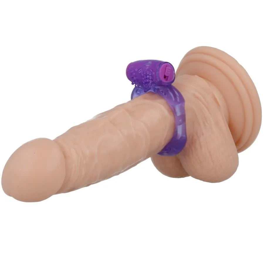Bague lilas en TPR flexible, stimulateur clitoridien et anneau excitateur, interrupteur intégré, ajustement universel.