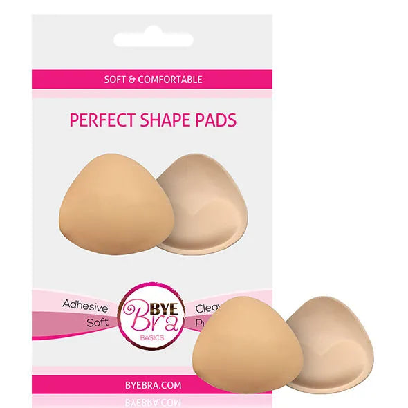 Coussinets push-up adhésifs beige BYE-BRA, forme triangulaire, effet décolleté, confort doux, emballage rose et blanc.