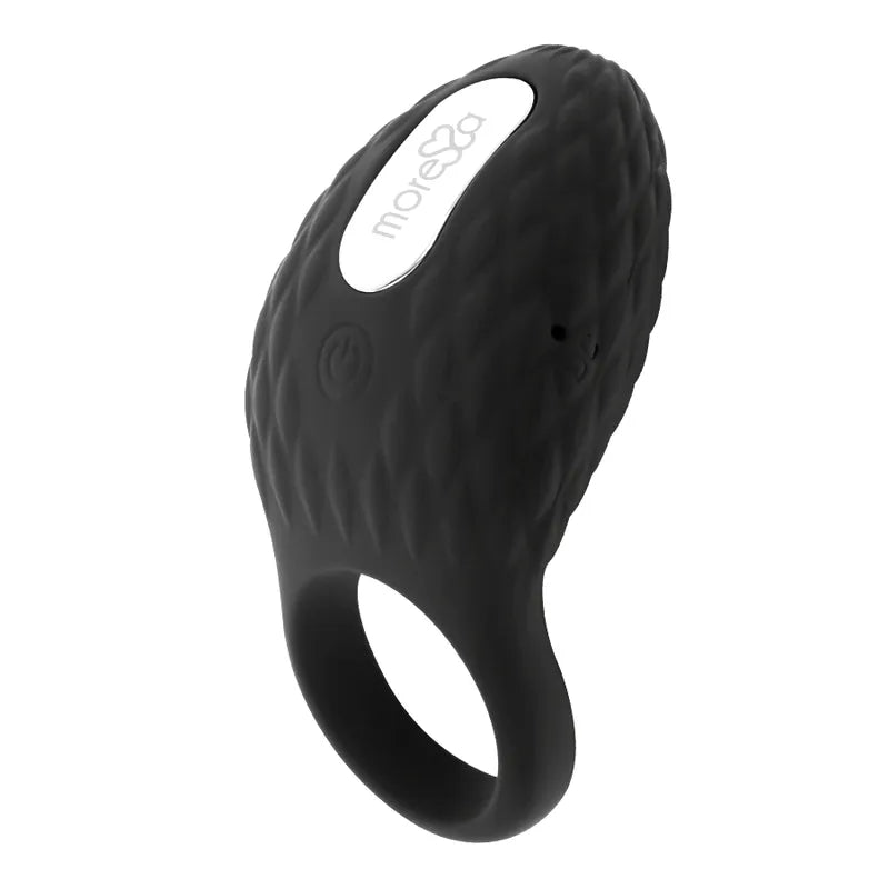 Anneau vibrant noir en silicone texturé, design ergonomique, rechargeable, pour plaisir prolongé et confort optimal.