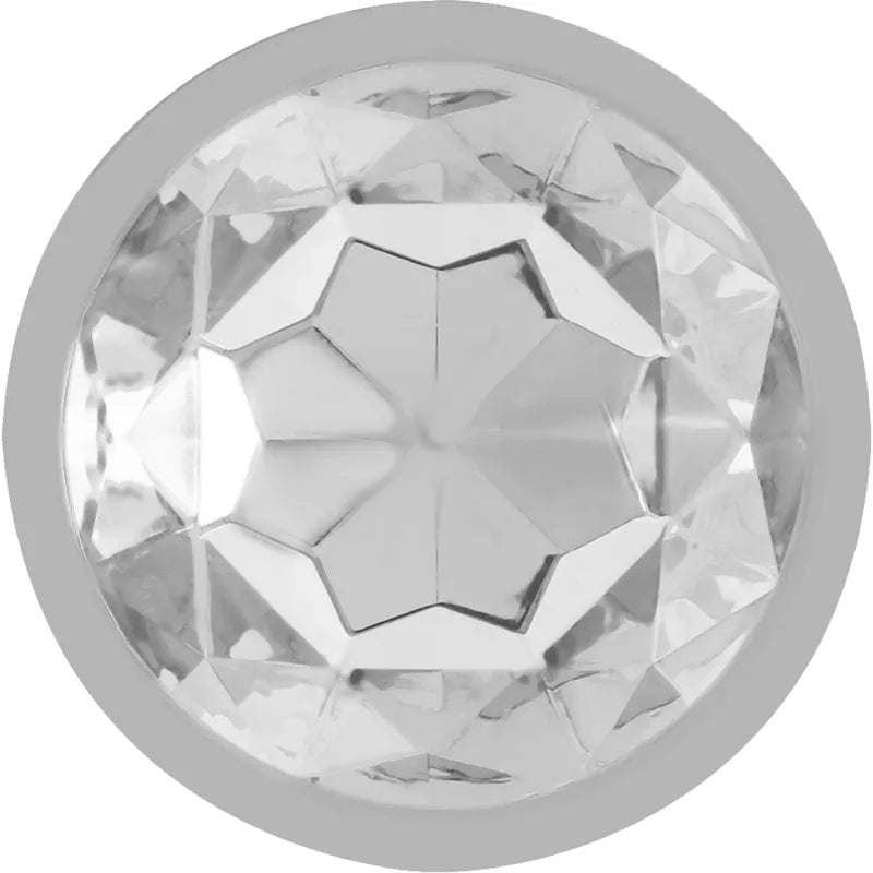 Plug anal en métal argenté avec bijou en diamant, design élégant et raffiné pour stimulation intime et plaisir luxueux.
